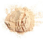 Whole food beige powder on a white background